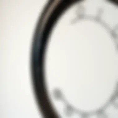 Close-Up of Round Mirror and Its Design Close-up of a round wall mirror with a black frame highlighting its intricate design