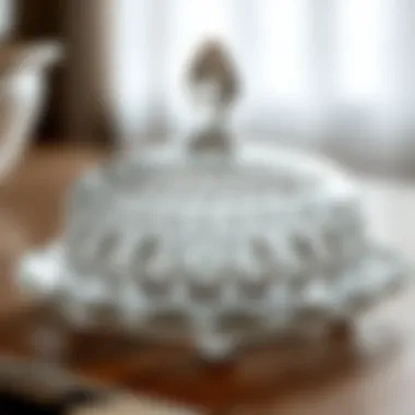 Intricate Patterns of Vintage Glass Butter Dish Close-up of intricate patterns on a vintage glass butter dish