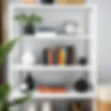 Elegant arrangement of books and decor on a white metal shelf