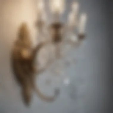 Close-up of intricately designed crystal sconce on a wall
