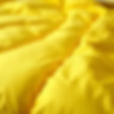 Close-up of the fabric texture of a yellow twin XL quilt
