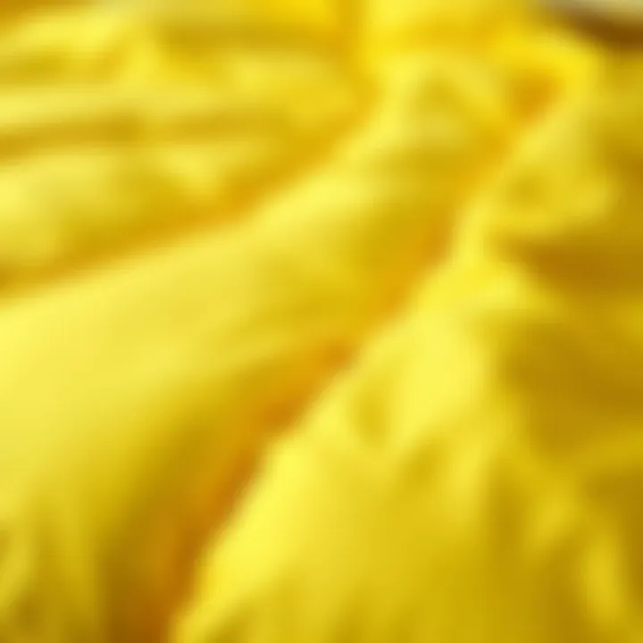 Close-up of the fabric texture of a yellow twin XL quilt
