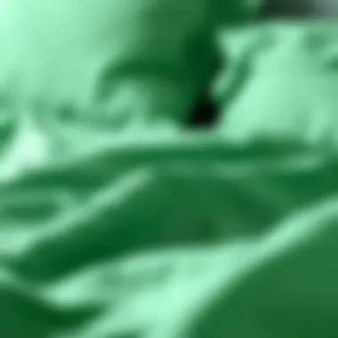 Close-up of soft emerald green fabric texture