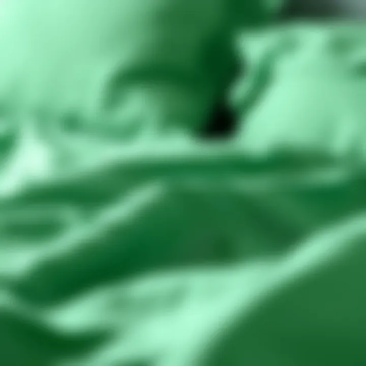 Close-up of soft emerald green fabric texture