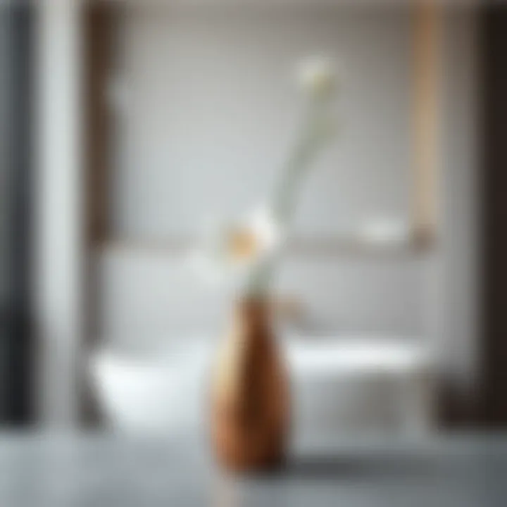 Minimalist metal vase showcasing a single elegant flower